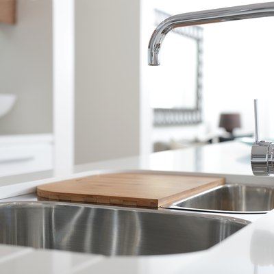 Stainless steel sink with chrome faucet