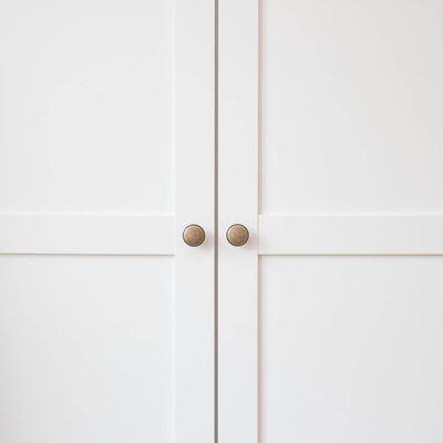 White closet doors wood closeup