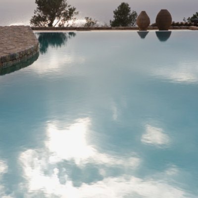 Swimming pool reflecting sky.