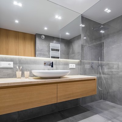 Bathroom with shower and mirror