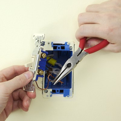 Electrician Replacing A Switch