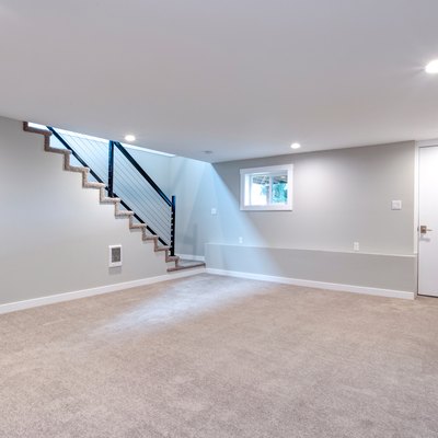 Light spacious basement area with staircase.