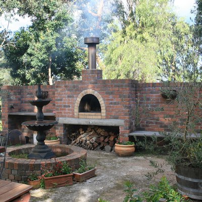 outdoor brick pizza oven and fountain