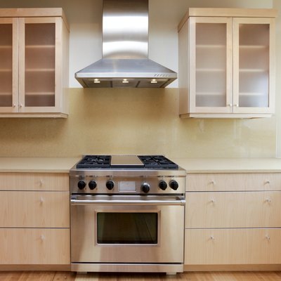 Stove and hood in modern kitchen