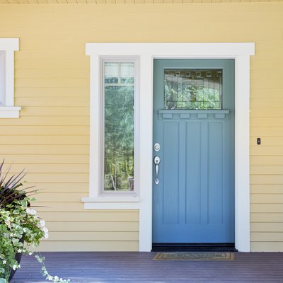 Front entrance of a home with blue door
