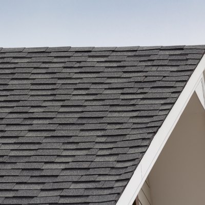 grey and black roof shingles of house