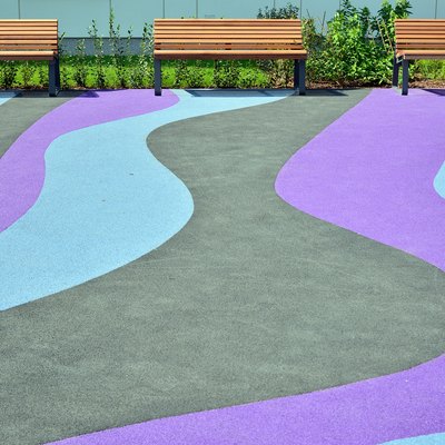 Playground rubber flooring. Colorful landscape.