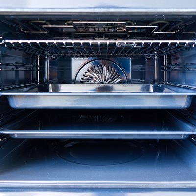 Modern oven with tray inside
