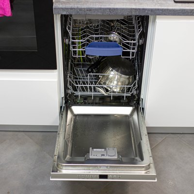 dishwasher in a white cupboard in a modern kitchen.