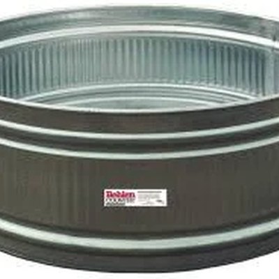 A galvanized metal round stock tank pool