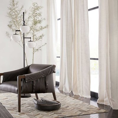 white blackout curtains in bright airy room