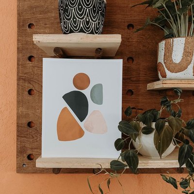 peg board decor featuring print