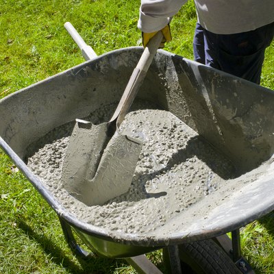 Mixing Cement by Hand in a Wheelbarrow.
