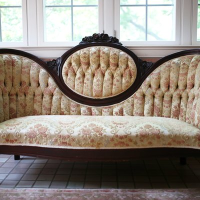 Vintage Victorian High Cameo Back Floral Sofa with Carved Mahogany Woodwork