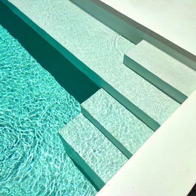 Stairs In Pool With Blue Water