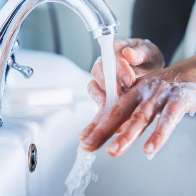 Washing hand at home.
