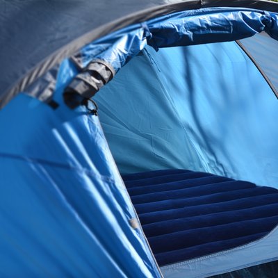 Tent With Air Mattress Set Up at a Campsite Outdoors