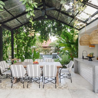 Dining room table and chairs on open kitchen