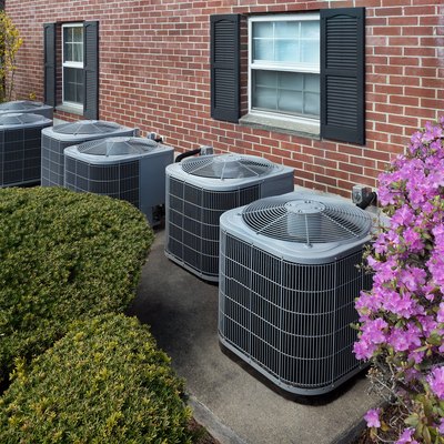 Air conditioning units outside an apartment complex