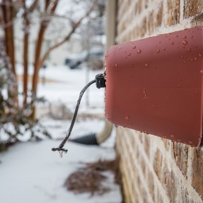 Outdoor faucet cover in winter.