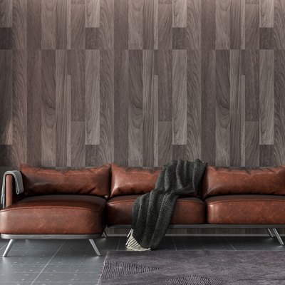 Leather Sofa With Wooden Wall And Fireplace