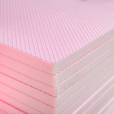 Pink Extruded Polystyrene XPS Foam Thermal Insulation Boards Stacked at Construction Site