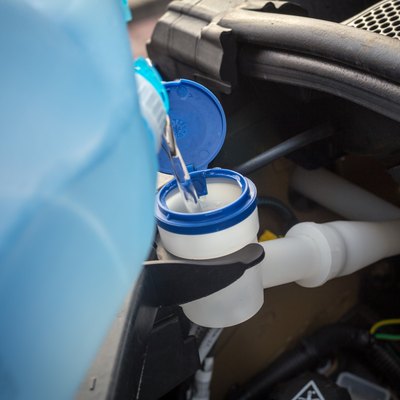 adding winter windscreen washer fluid in the car