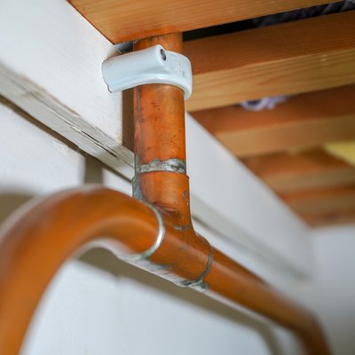 Closeup of domestic copper pipe plumbing.