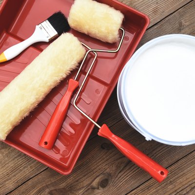 Painted tool with roller paint brush paint bucket canned paint