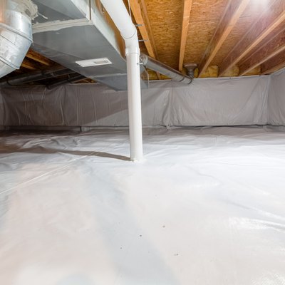 Crawl space fully encapsulated with thermoregulatory blankets