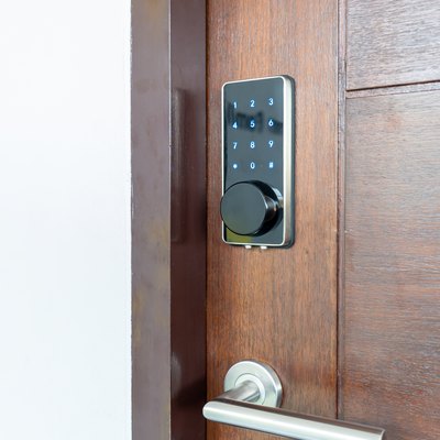 Electronic door lock security systems with key pads open by password number.