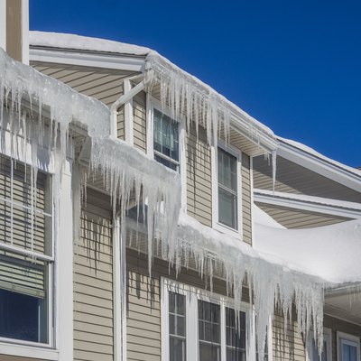 Ice dams and snow on roof and gutters