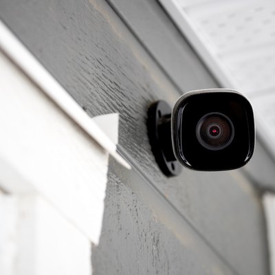 Black cctv outside building, home security system