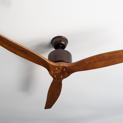 wooden ventilation fan on the white ceiling