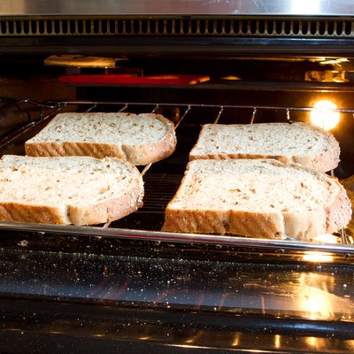 Making toast in an oven.