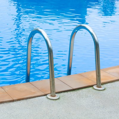 SWIMMING POOL WITH STAINLESS HANDRAIL