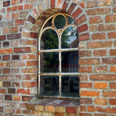 A beautiful vintage arched window.