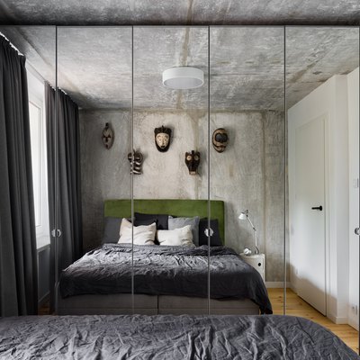Modern designed bedroom with mirror wardrobe