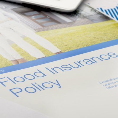 Flood insurance policy brochure with image of a couple
