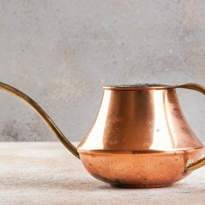 Old copper watering can.