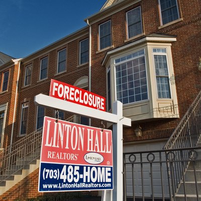 A recently foreclosed townhouse is seen