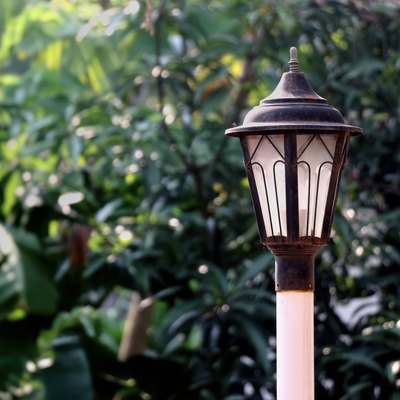 Lamp post in garden in daylight