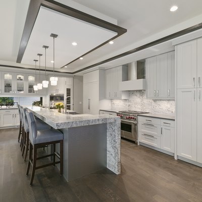Wide-open kitchen with LED lighting and recessed lighting.