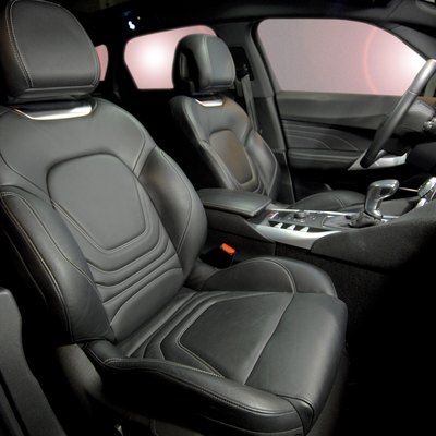 Leather seats - interior of black car.
