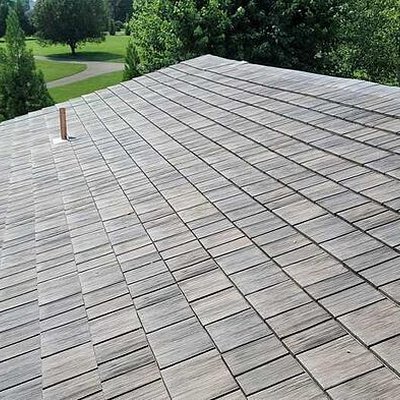 A synthetic wood shake roof