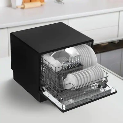 A black portable dishwasher on top of a counter