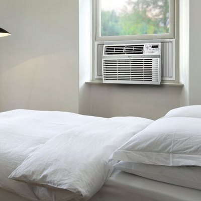 LG window air conditioner in gray and white bedroom