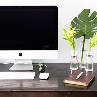 Computer and keyboard on a desk