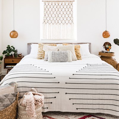 Bedroom with Boho furnishings and plants