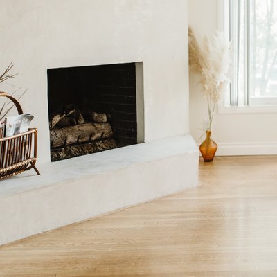 Large white fireplace with boho decor